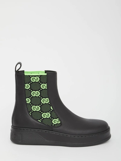 Shop Gucci Gg Jersey Ankle Boots In Black