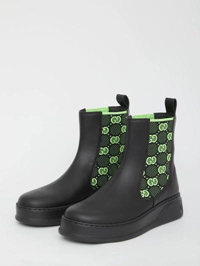 Shop Gucci Gg Jersey Ankle Boots In Black