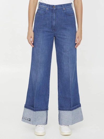 Shop Gucci Print Jeans In Blue
