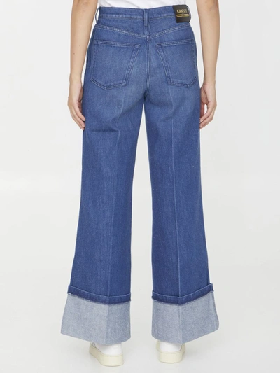 Shop Gucci Print Jeans In Blue