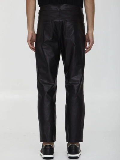 Shop Gucci Shiny Leather Trousers In Black