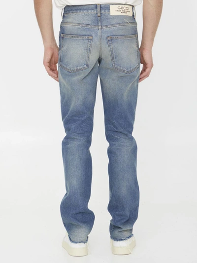Shop Gucci Délavé Denim Jeans In Blue