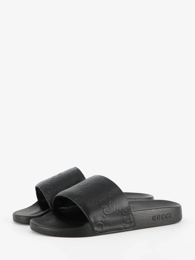 Shop Gucci Gg Slider Sandals In Black