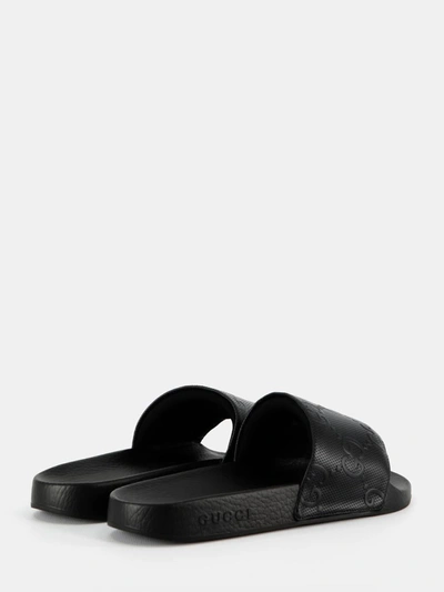 Shop Gucci Gg Slider Sandals In Black