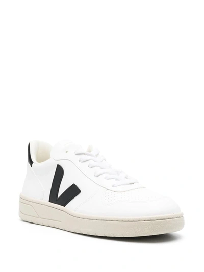 Shop Veja V-10 Low-top Sneakers In White/black