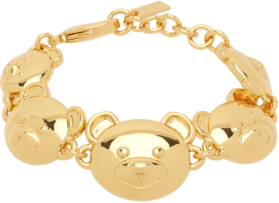 Shop Moschino Gold Teddy Bear Bracelet In A0606 Shiny Gold
