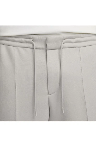 Shop Nike Reimagined Tech Fleece Sweatpants In Light Iron Ore