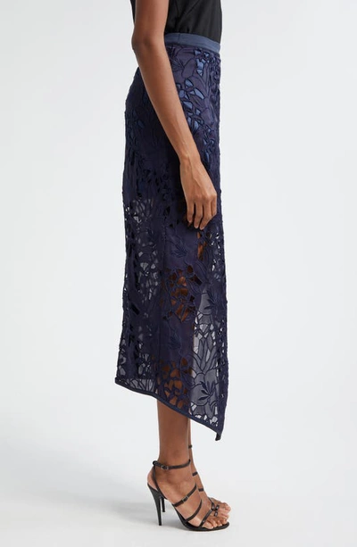 Shop Ramy Brook Irene Floral Lace Asymmetric Skirt In Navy Sateen Floral Cutout