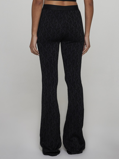 Shop Palm Angels Lame Monogram Jacquard Trousers In Nero