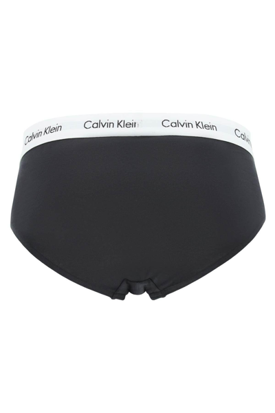 Shop Calvin Klein Tri-pack Underwear Briefs