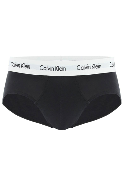 Shop Calvin Klein Tri-pack Underwear Briefs