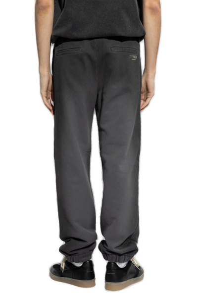 Shop Fendi Pocketed Straight-leg Jogging Pants In Black