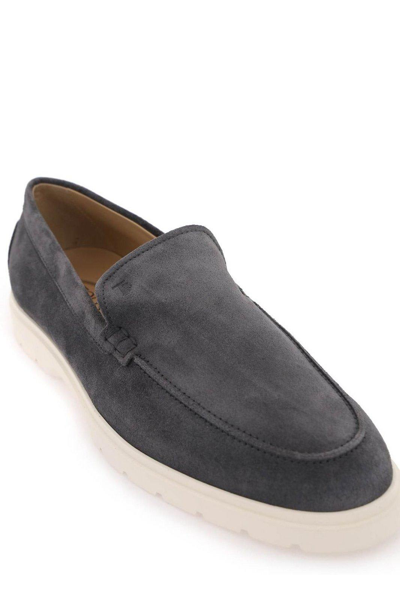 Shop Tod's Logo Embossed Slip-on Loafers In Grigio