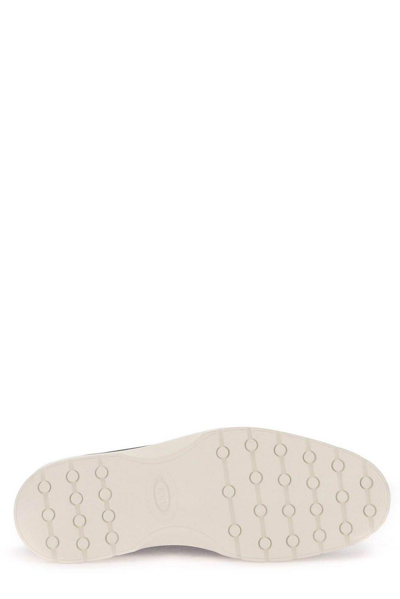 Shop Tod's Logo Embossed Slip-on Loafers In Grigio