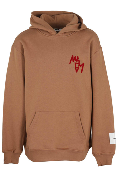 Shop Msgm Long Sleeved Logo Embroidered Hoodie In Marrone