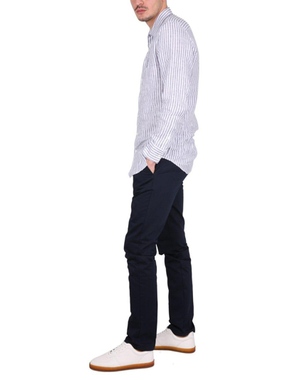 Shop Ami Alexandre Mattiussi Button Detailed Slim Fit Pants In Blue