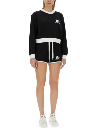 Shop Dolce & Gabbana Dg Logo Embroidered Jersey Shorts In Black