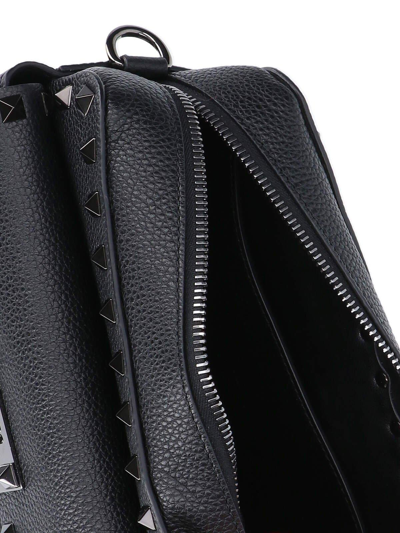 Shop Valentino Garavani Rockstud Zip-up Messenger Bag In Black