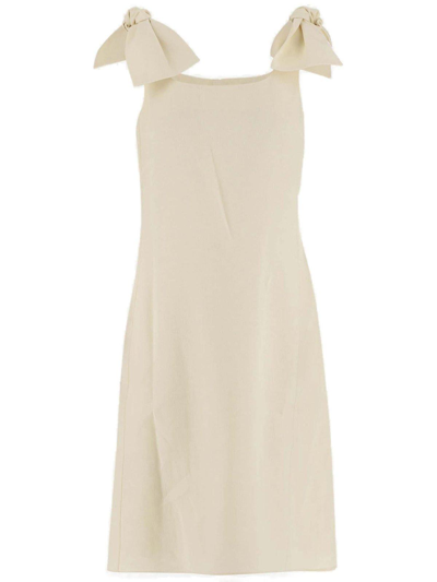 Shop Chloé Bow-detailed Sleeveless Dress In Bianco