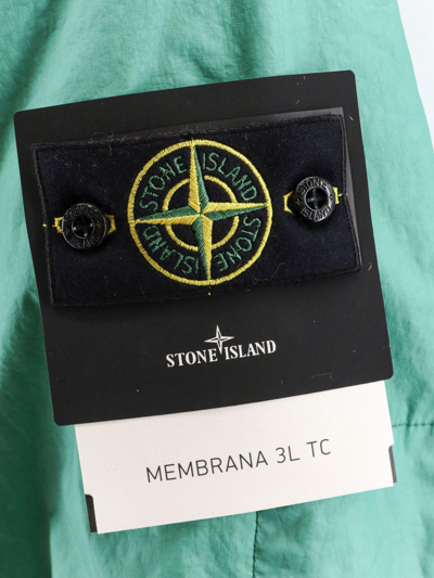 Shop Stone Island Logo Patch Drawstring-hooded Raincoat In Green