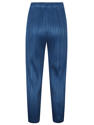 Shop Issey Miyake Pleated Cropped Trousers In Blue