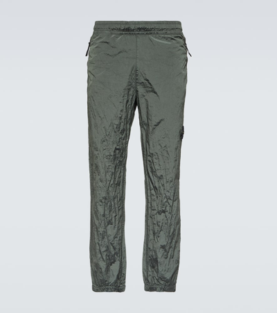 Shop Stone Island Compass Track Pants In Green