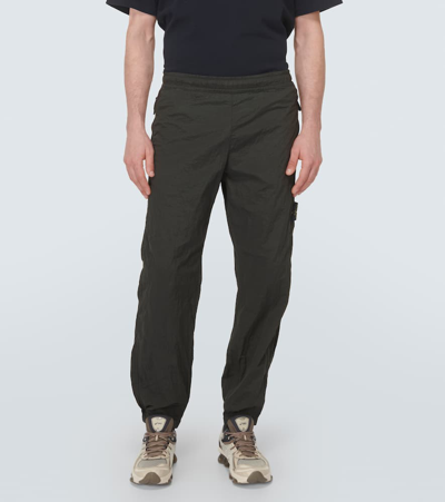 Shop Stone Island Compass Track Pants In Green