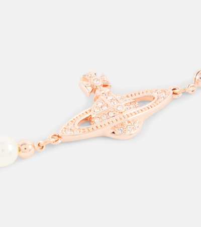 Shop Vivienne Westwood Mini Bas Relief Orb Embellished Bracelet In Pink