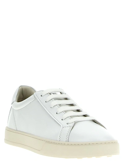Shop Tod's Leather Sneakers In White