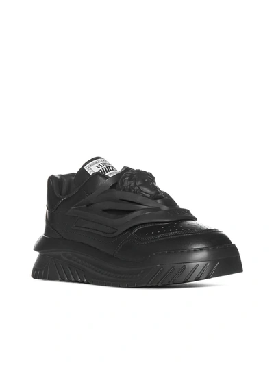 Shop Versace Sneakers In Black