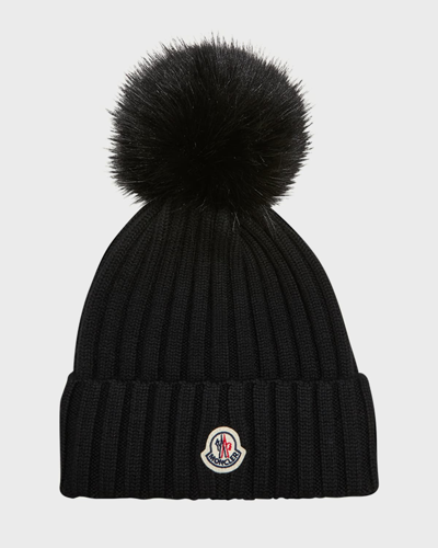 Shop Moncler Ribbed Wool Beanie With Faux Fur Pom In Black