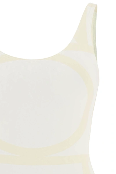Shop Totême One Piece Monogram Swimsuit In White, Beige