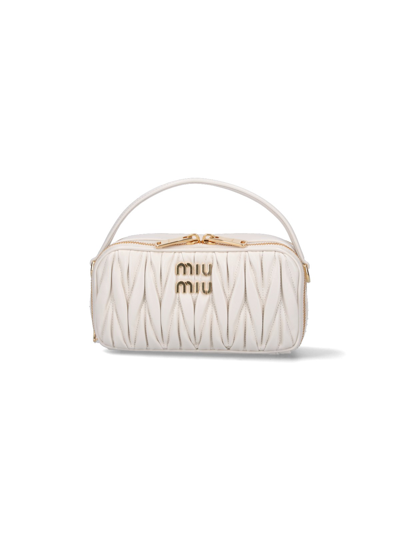 Shop Miu Miu Matelassé Crossbody Bag In White