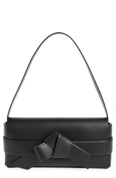 Shop Acne Studios Musubi Elongated Bow Detail Leather Crossbody Bag In Black