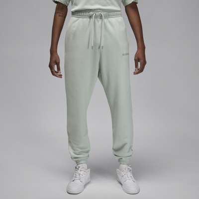 Shop Jordan Men's  Wordmark Fleece Pants In Grey