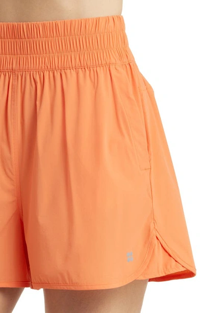 Shop Sweaty Betty Training Shorts In Orange