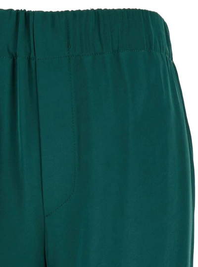 Shop Plain Green Relaxed Pants With Elastic Waistband In Fabric Woman