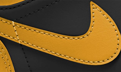 Shop Jordan Air  1 Low Sneaker In Black/ Yellow Ochre/ White