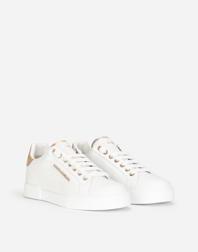 Shop Dolce & Gabbana Sneaker In White/gold