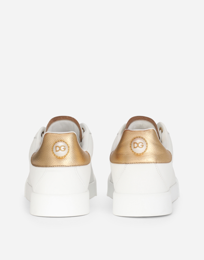 Shop Dolce & Gabbana Sneaker In White/gold