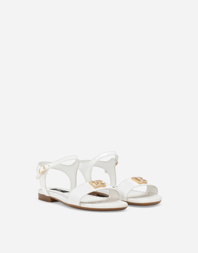 Shop Dolce & Gabbana Patent Leather Sandals In ホワイト