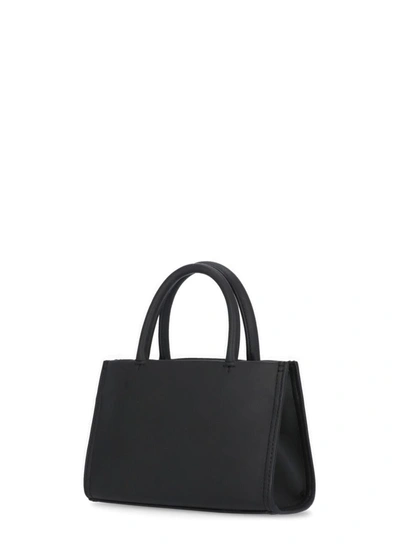 Tory Burch Handbag With Embossed Logo On The Front In Black