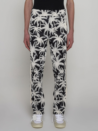 Shop Palm Angels All-over Logo Track Pants In Nero