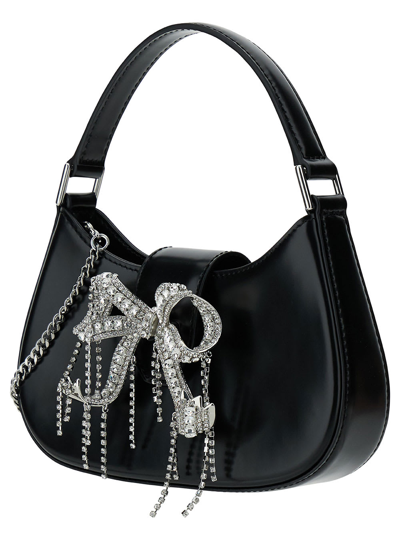 Shop Self-portrait Black Hobo Bag With Swarowski Bow Detail In Glossy Leather Woman