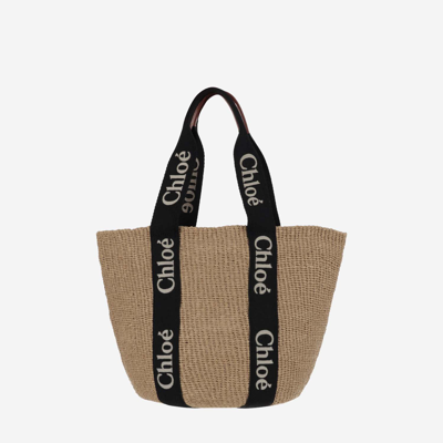 Shop Chloé Large Woody Basket Bag In Black - Beige 1