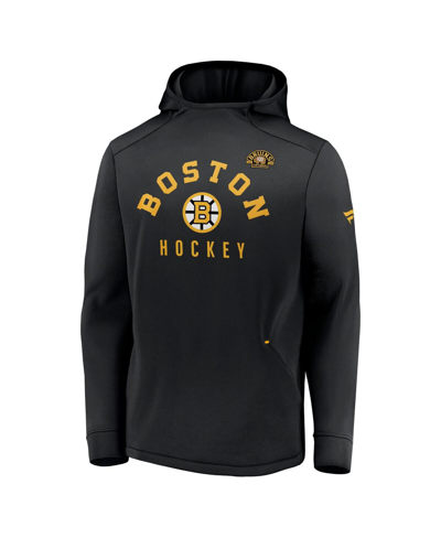 Shop Fanatics Men's  Black Distressed Boston Bruins Centennial Lockup Authentic Pro Pullover Hoodie