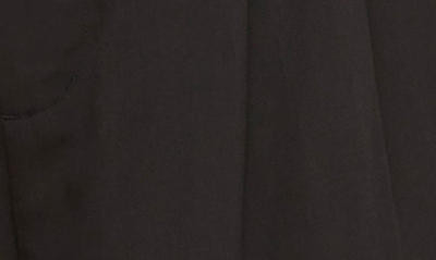 Shop Vince Pleated Tencel® Lyocell Shorts In Black