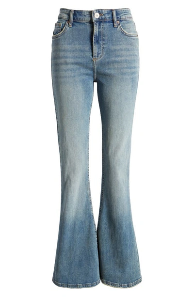 Shop Bdg Urban Outfitters Mid Rise Flare Jeans In Light Wash