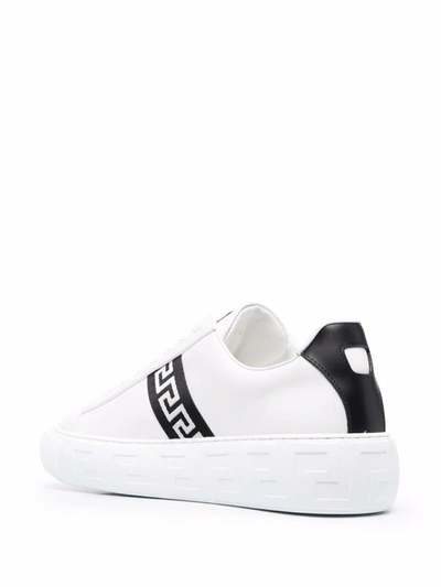 Shop Versace Greca Sneakers In White