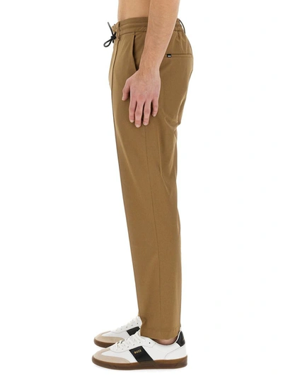 Shop Hugo Boss Boss Pants With Elastic In Brown